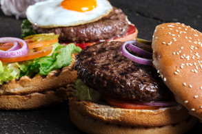 El Barrio showcasing a burger and chips. 