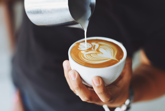 El Barrio made a fresh cappuccino.