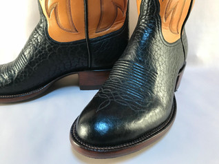 A pair of boots by J&M Custom Boots